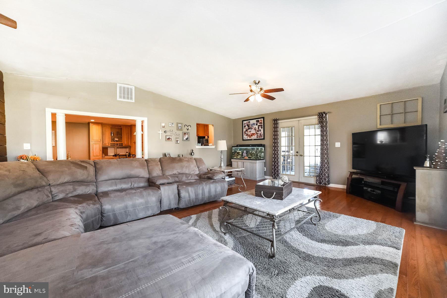 16200 Inheritance Drive Brandywine, MD 20613 - Photo 8 of 30 Great room w/ doors leading to sunroom