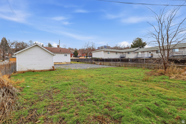 871 North 700 East Logan, UT 84321 - Photo 18 of 20 Fenced backyard featuring a residential view