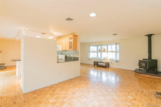 a view of livingroom with furniture and a window