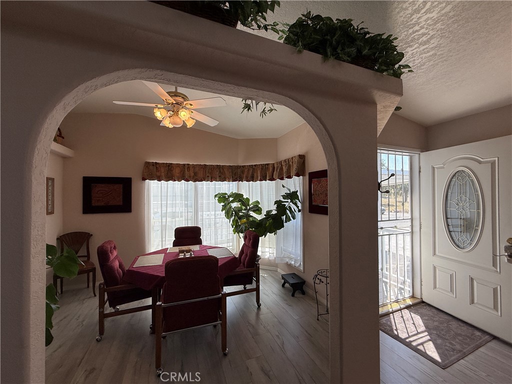 1550 Rory Lane Simi Valley, CA 93063 - Photo 5 of 18 a living room with furniture and a chandelier