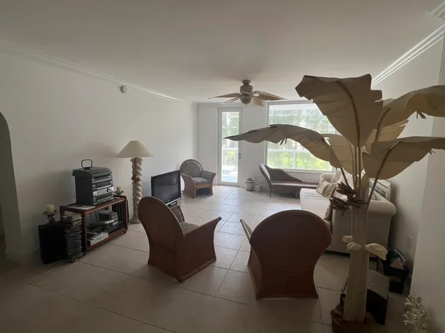 a kitchen with a sink a stove and cabinets