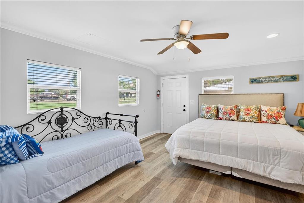 114 Baker B Ranch Road Trinidad, TX 75163 - Photo 20 of 32 a bedroom with a large bed and a window
