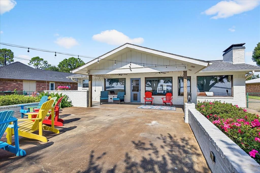 114 Baker B Ranch Road Trinidad, TX 75163 - Photo 24 of 32 a view of a house with sitting area and garden
