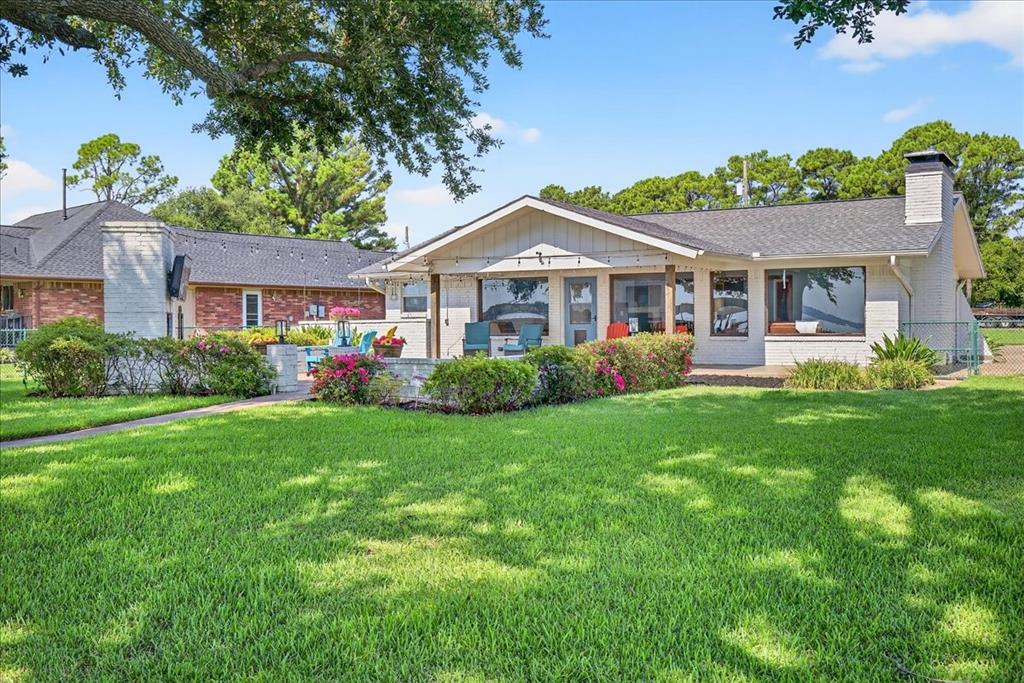 114 Baker B Ranch Road Trinidad, TX 75163 - Photo 29 of 32 a front view of a house with a yard and potted plants
