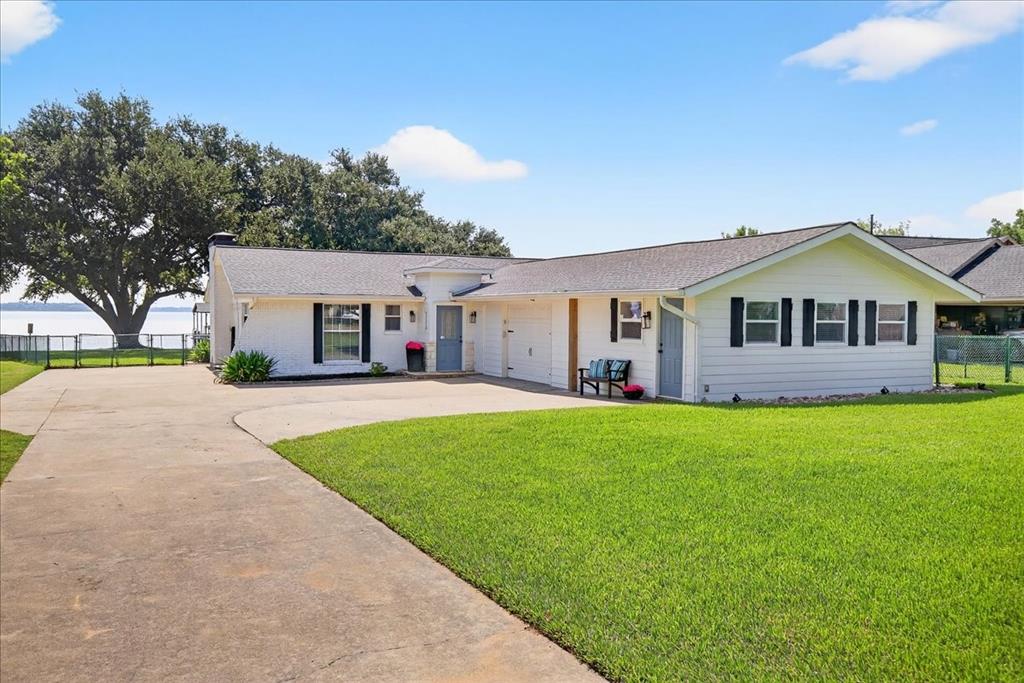 114 Baker B Ranch Road Trinidad, TX 75163 - Photo 30 of 32 a view of house with a yard