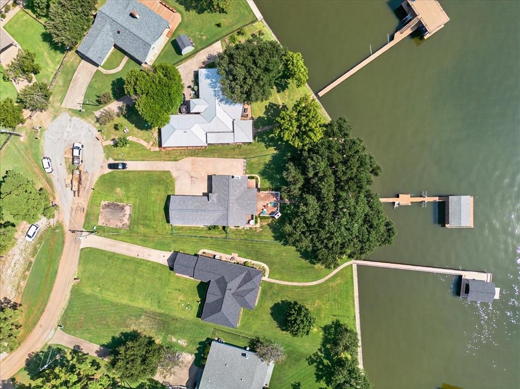 114 Baker B Ranch Road Trinidad, TX 75163 - Photo 32 of 32 an aerial view of a house with a garden