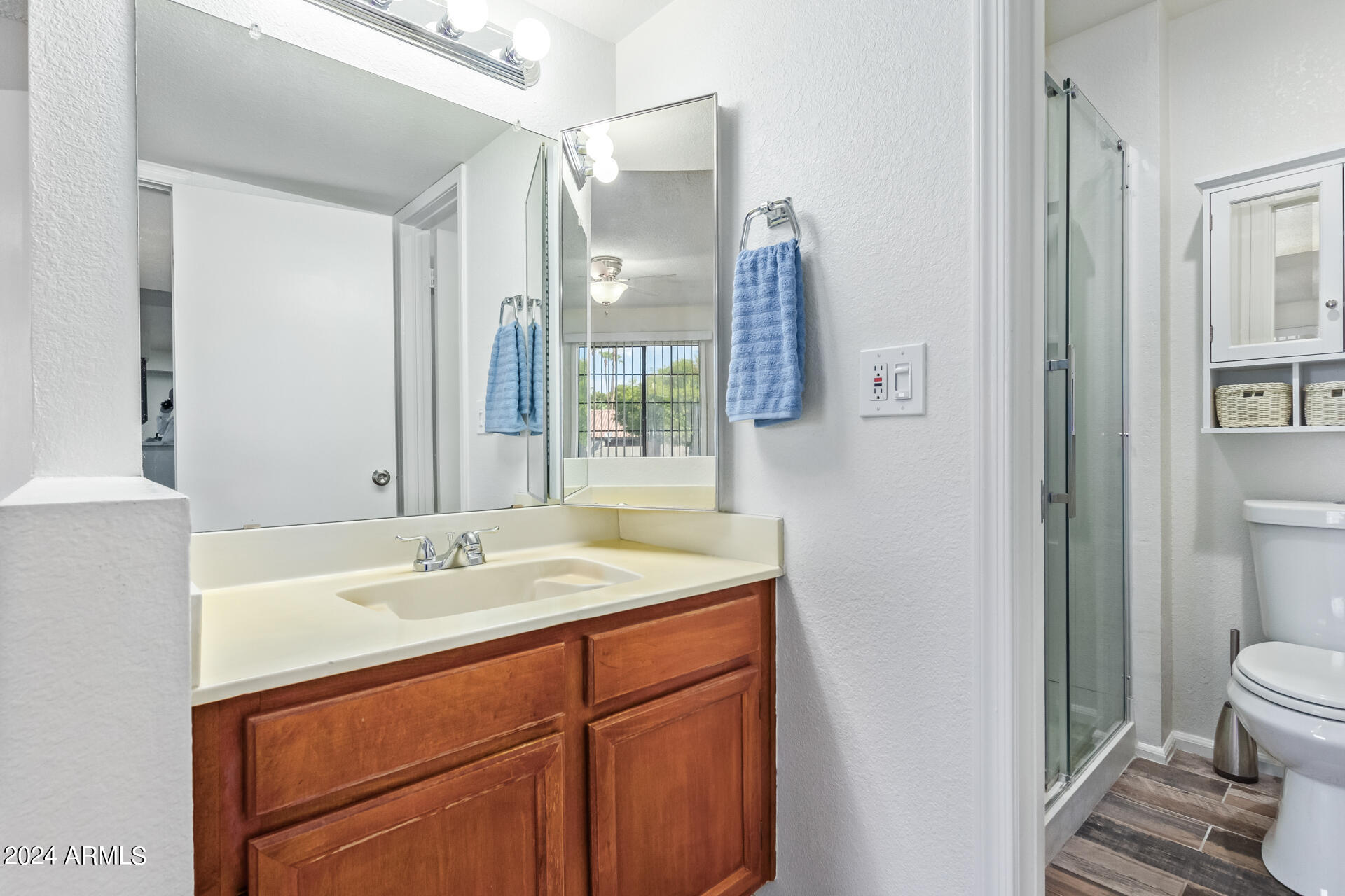 533 West Guadalupe Road, Unit 2046 Mesa, AZ 85210 - Photo 16 of 29 a bathroom with a sink and a mirror