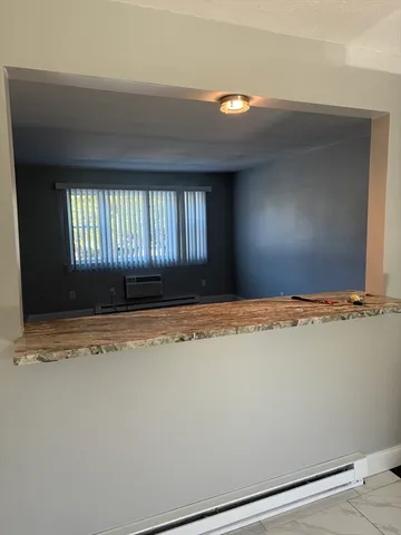 a view of a livingroom with a window