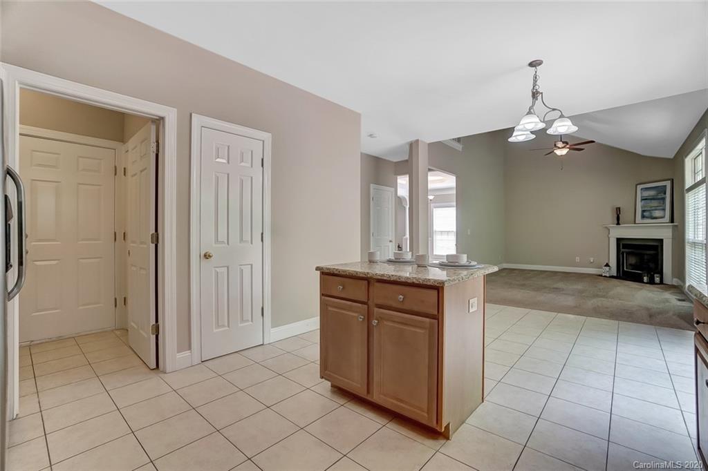 14010 Wild Elm Road Charlotte, NC 28277 - Photo 15 of 36 a spacious bathroom with a granite countertop sink a mirror and a shower
