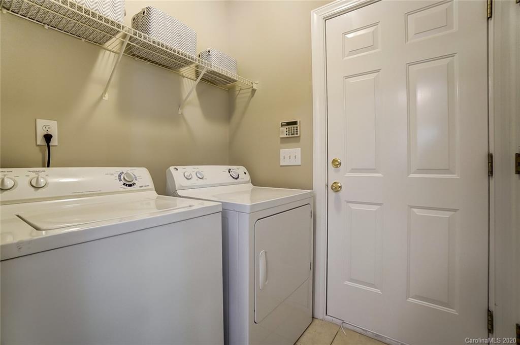 14010 Wild Elm Road Charlotte, NC 28277 - Photo 19 of 36 a utility room with dryer and washer
