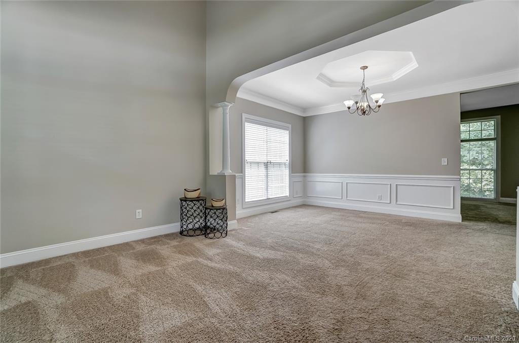 14010 Wild Elm Road Charlotte, NC 28277 - Photo 4 of 36 a view of an empty room with a window