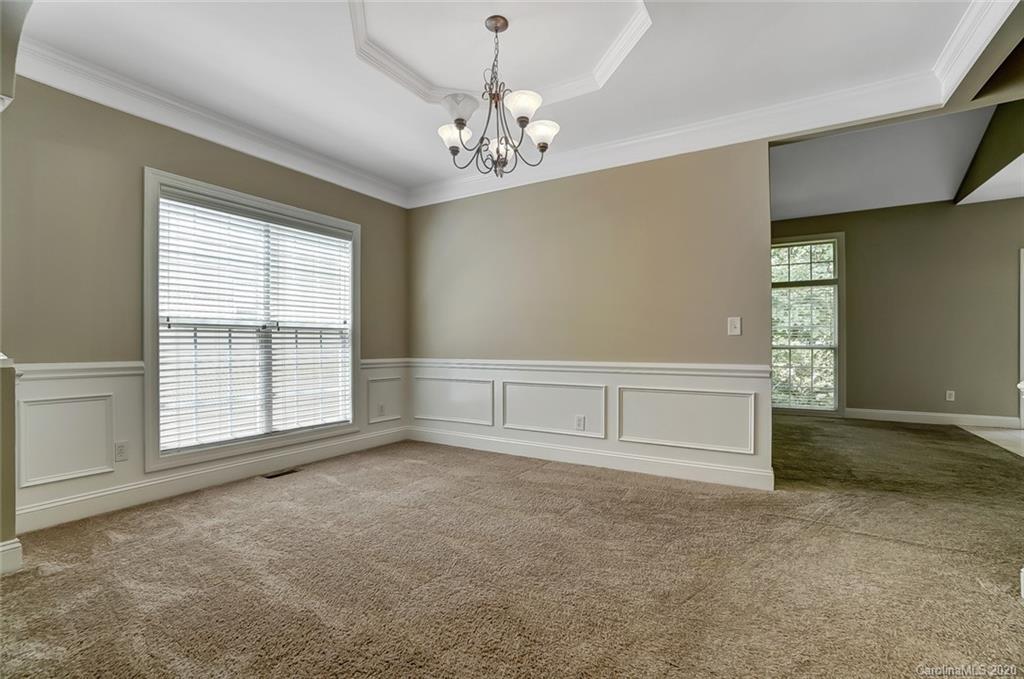 14010 Wild Elm Road Charlotte, NC 28277 - Photo 6 of 36 a view of an empty room with a window