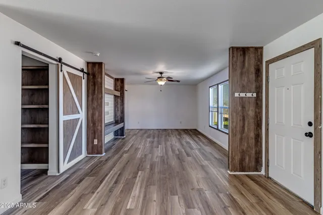 a view of a hallway with entryway