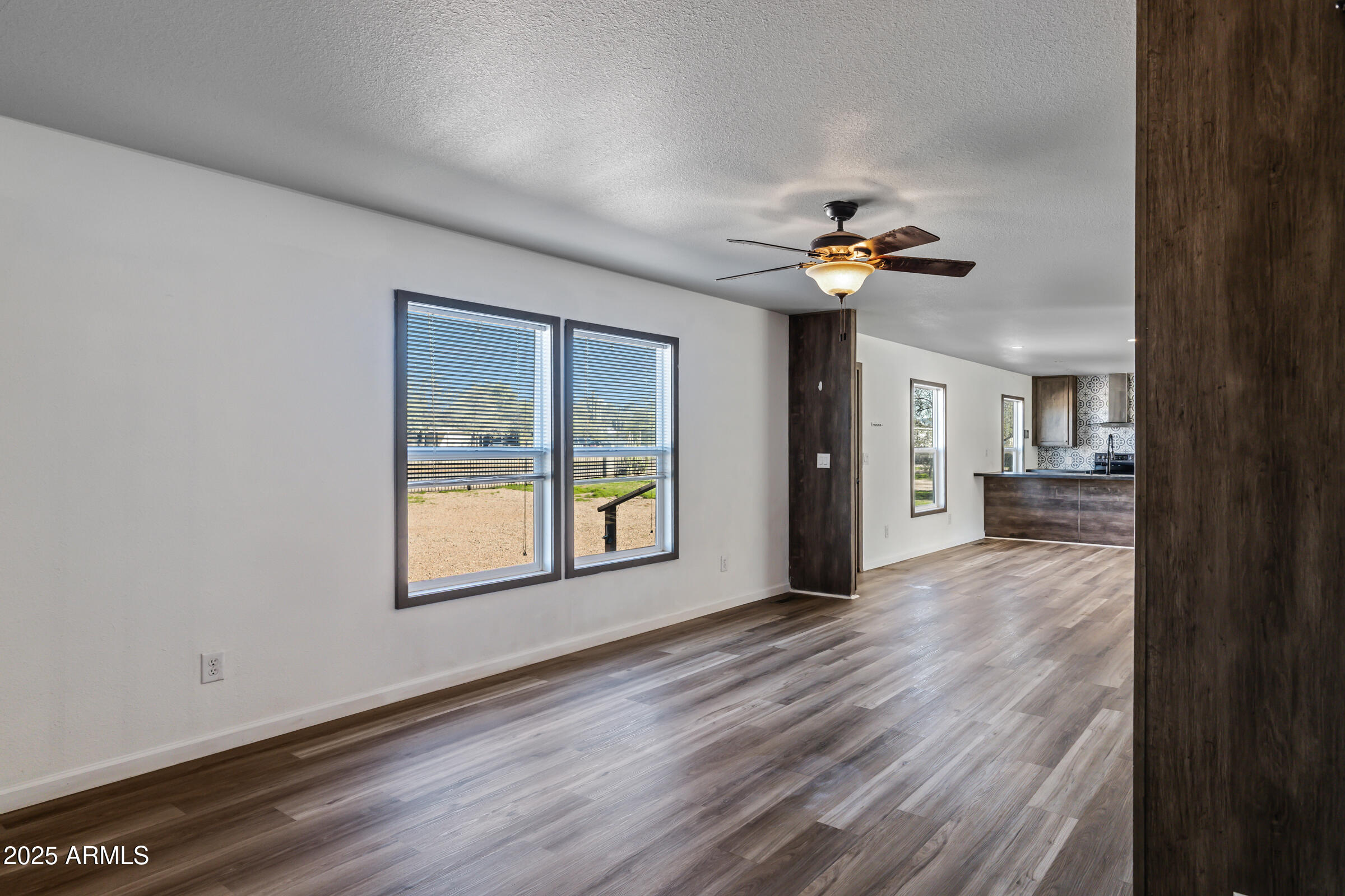11341 East 6th Avenue Apache Junction, AZ 85120 - Photo 17 of 37 a view of an empty room with a window