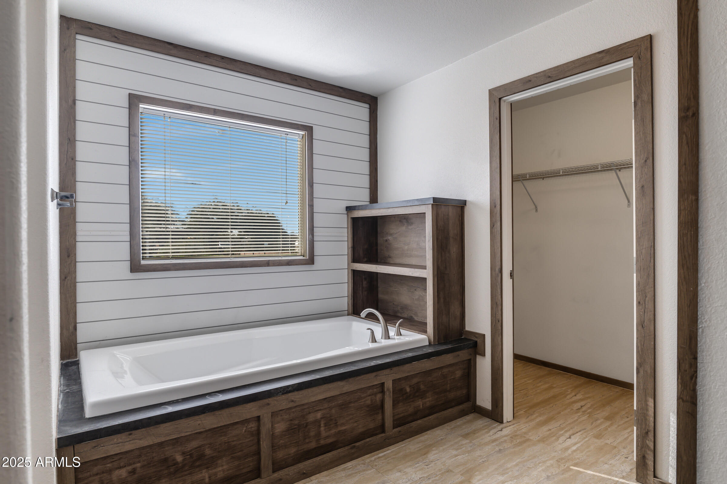 11341 East 6th Avenue Apache Junction, AZ 85120 - Photo 27 of 37 a bathroom with a sink and a mirror