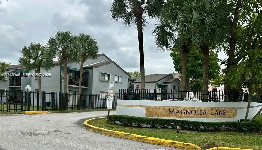 7405 Southwest 152nd Avenue, Unit 105 Miami, FL 33193 - Photo 8 of 9 a view of a house with swimming pool and sitting area