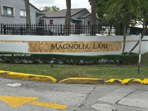 7405 Southwest 152nd Avenue, Unit 105 Miami, FL 33193 - Photo 9 of 9 a view of swimming pool with a yard