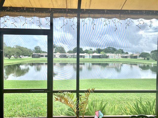 18900 Haywood Terrace, Unit 5 Boca Raton, FL 33496 - Photo 12 of 18 Back Patio w/Lake View