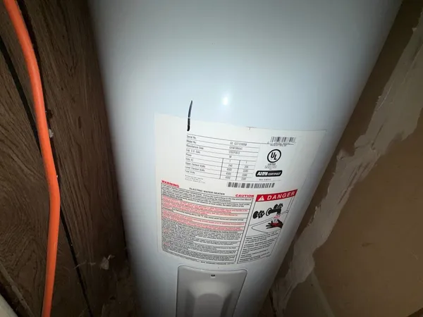 a living room with furniture and a gate