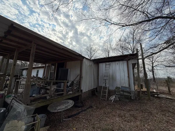 a view of a back yard of the house