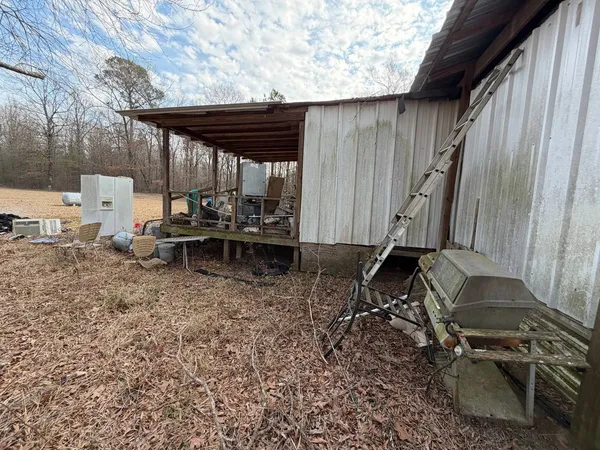a sign board with a yard