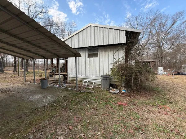 a view of a back yard of the house