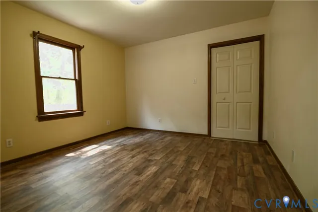 an empty room with windows