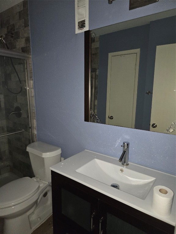 6401 Deihl Road, Unit 1006 Houston, TX 77092 - Photo 12 of 19 a bathroom with a toilet sink and mirror