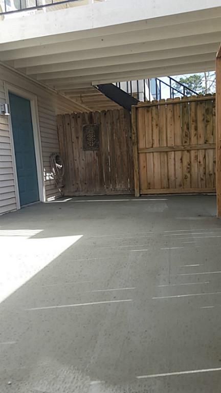 6401 Deihl Road, Unit 1006 Houston, TX 77092 - Photo 17 of 19 a view of a car garage