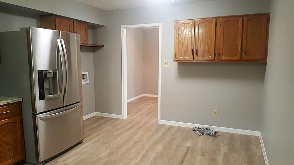 6401 Deihl Road, Unit 1006 Houston, TX 77092 - Photo 2 of 19 a view of a refrigerator in kitchen and a refrigerator