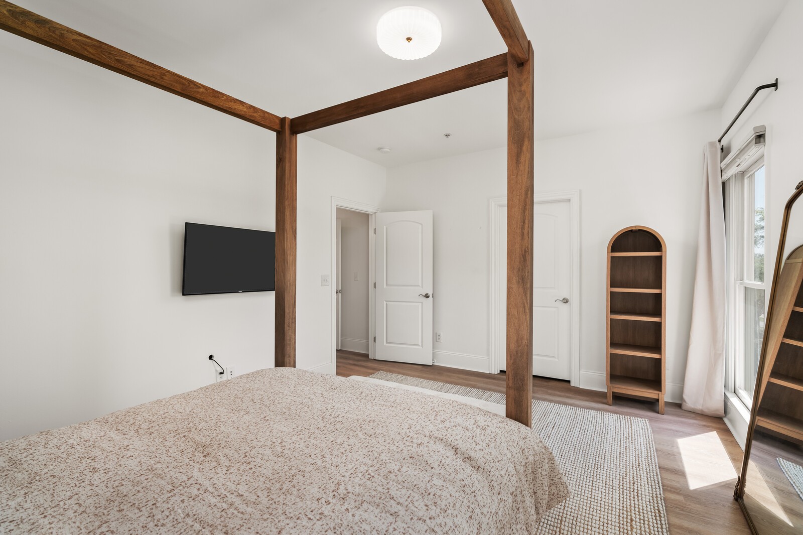 147 Generals Retreat Place Franklin, TN 37064 - Photo 31 of 43 a bedroom with a bed and a flat screen tv