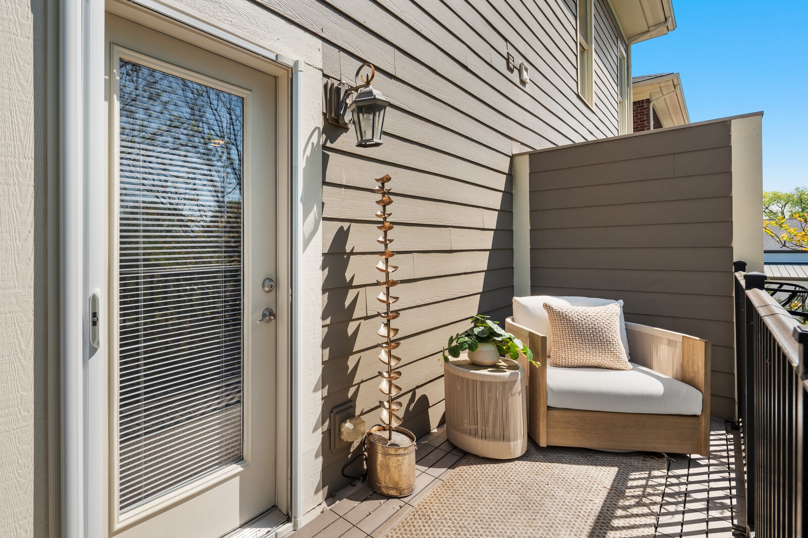 147 Generals Retreat Place Franklin, TN 37064 - Photo 36 of 43 a view of a patio with table and chairs and potted plants