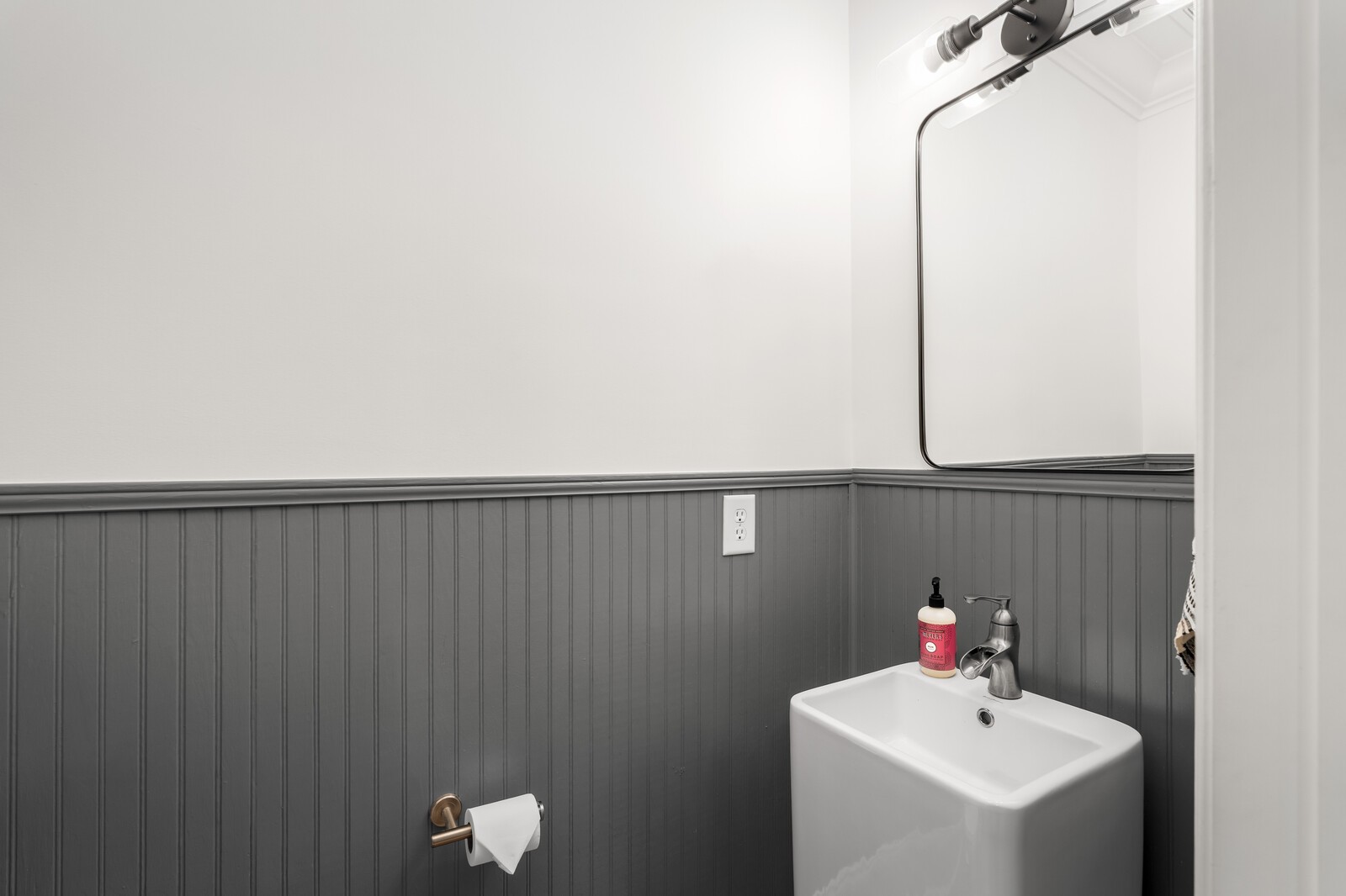 147 Generals Retreat Place Franklin, TN 37064 - Photo 10 of 43 a bathroom with a sink and mirror