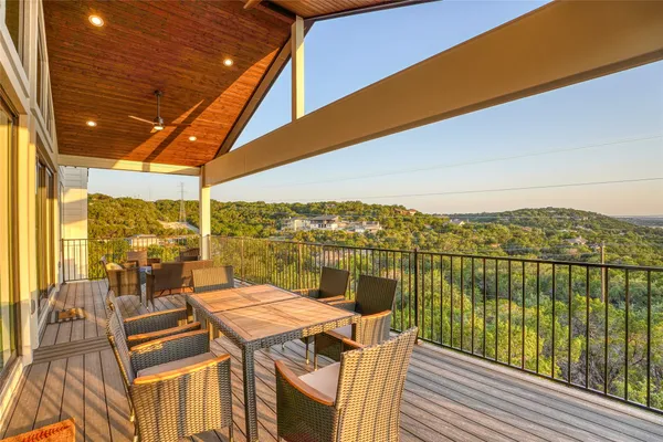 a view of a balcony with an outdoor space