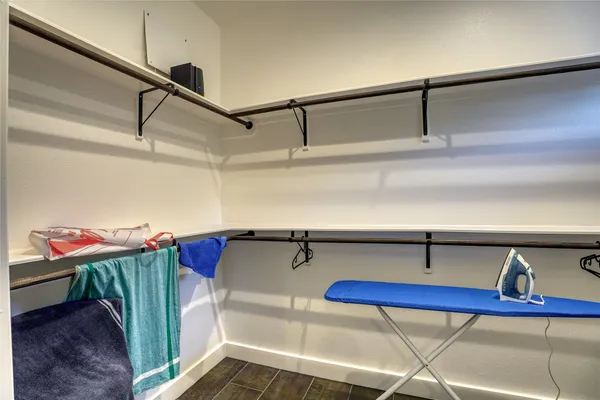 a view of a bedroom with furniture and furniture