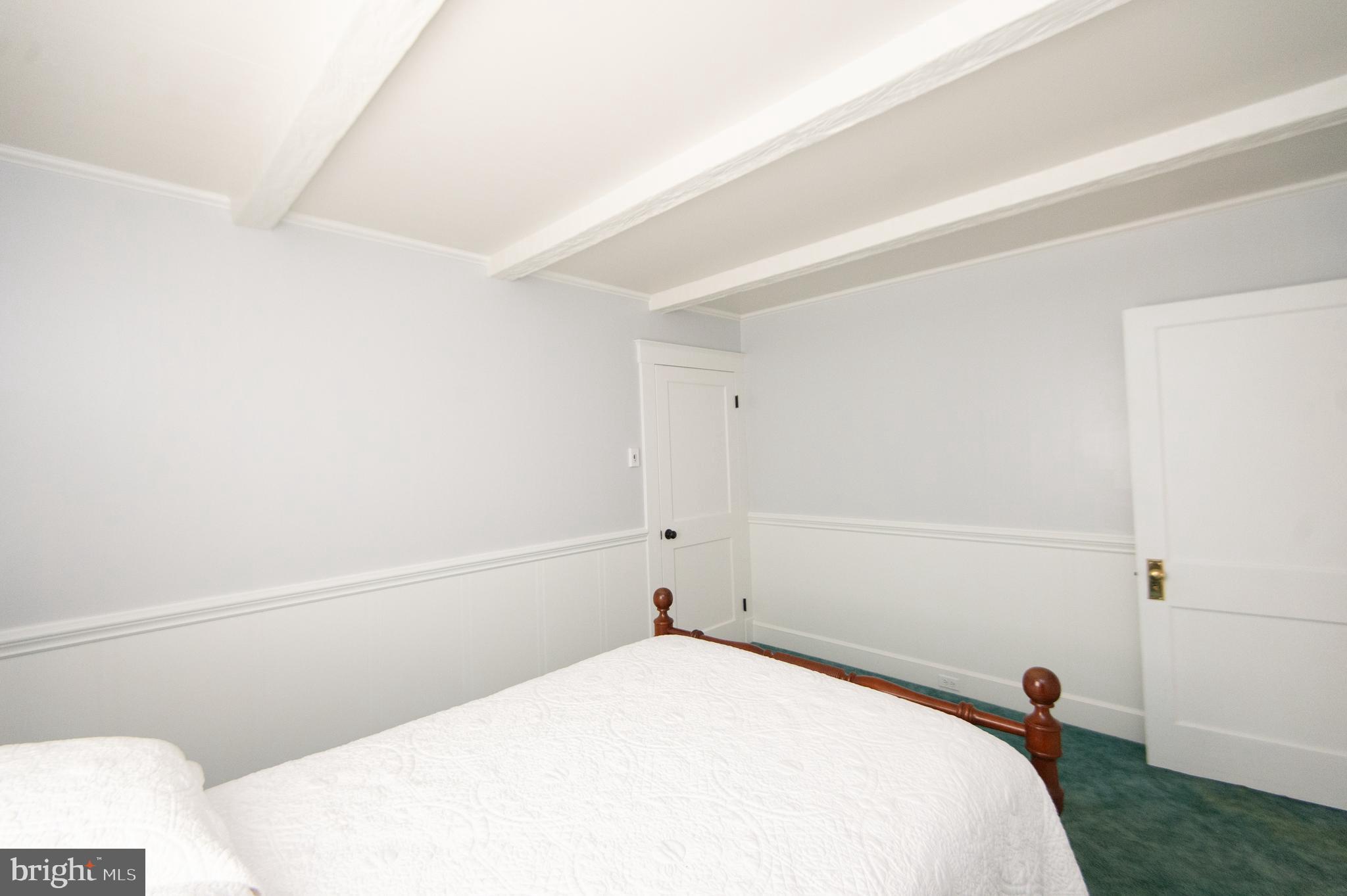 409 Bayly Avenue Cambridge, MD 21613 - Photo 21 of 54 a bedroom with a bed and a window