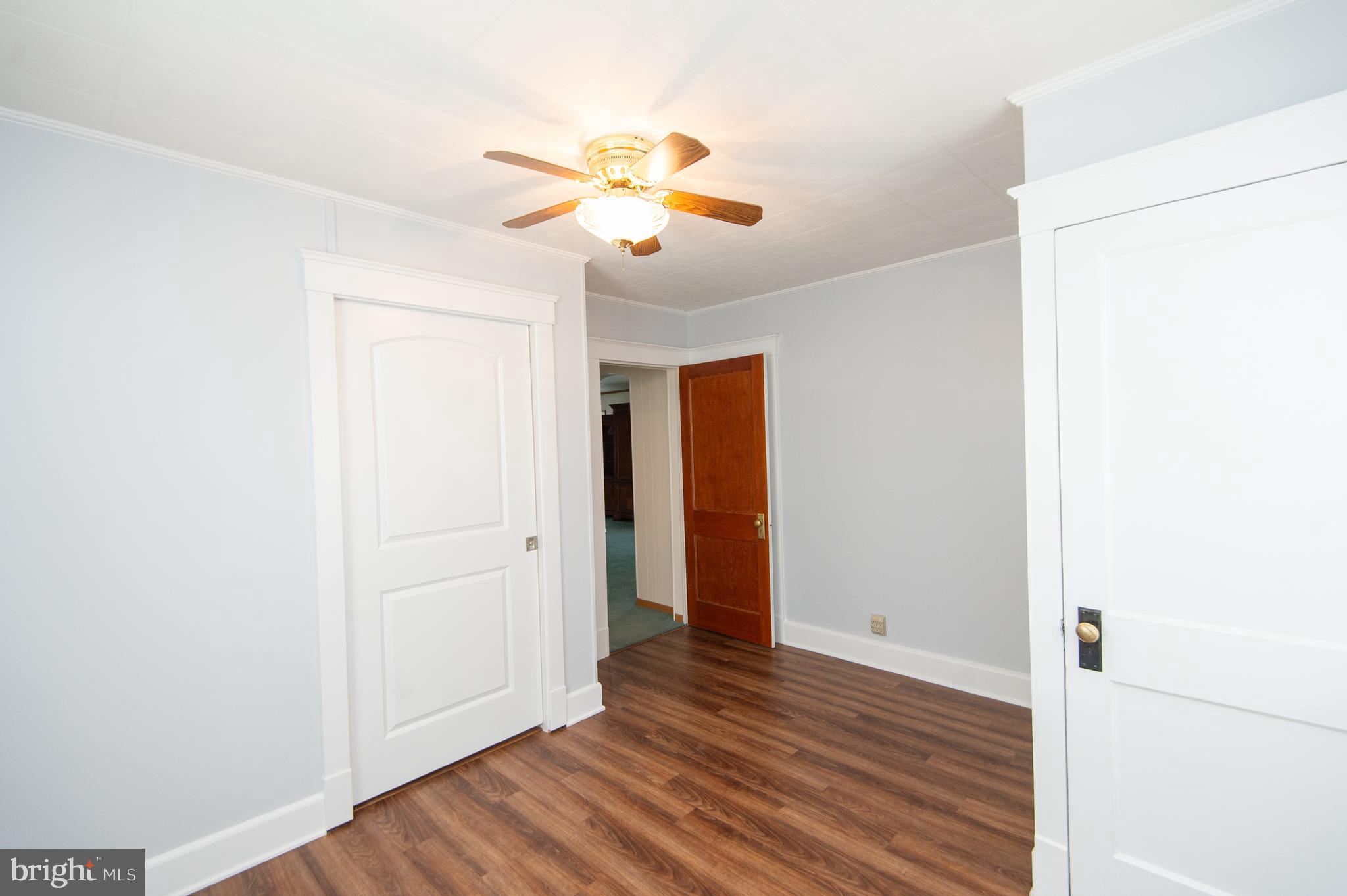 409 Bayly Avenue Cambridge, MD 21613 - Photo 24 of 54 a view of a livingroom with wooden floor