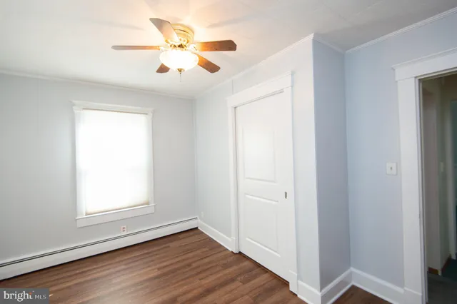 a view of storage and utility room with washer and dryer