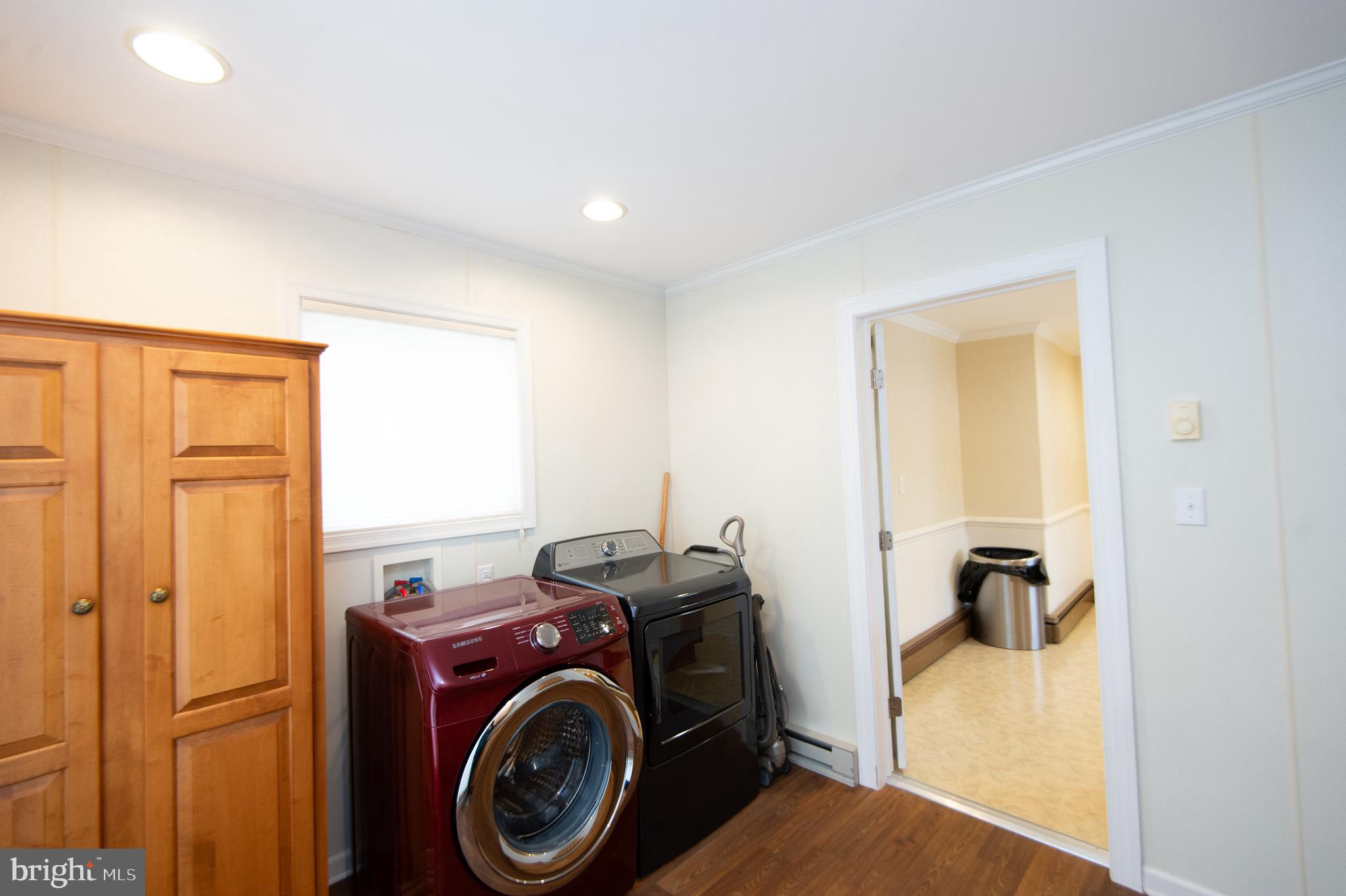 409 Bayly Avenue Cambridge, MD 21613 - Photo 32 of 54 a utility room with dryer and washer