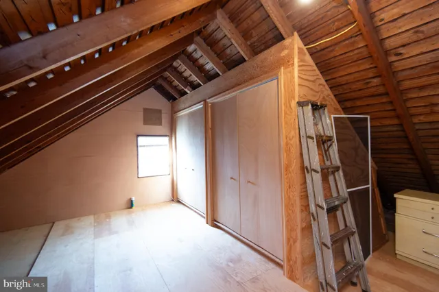 a bathroom with a glass door shower