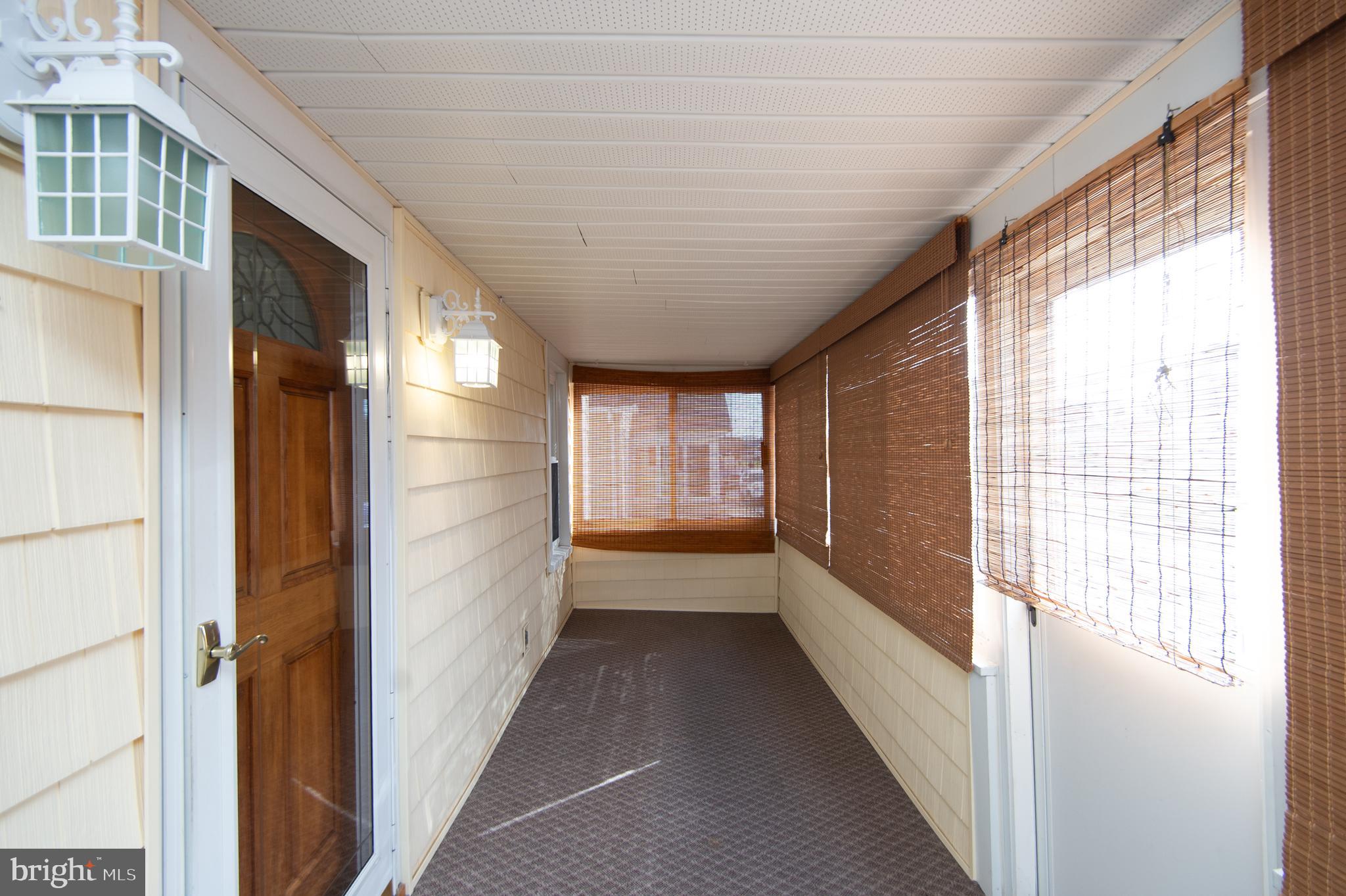 409 Bayly Avenue Cambridge, MD 21613 - Photo 36 of 54 a view of hallway with windows