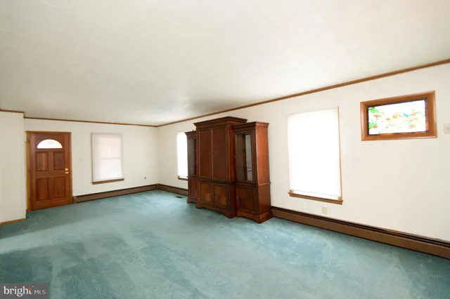 an empty room with windows