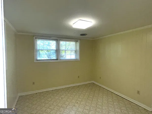 an empty room with a window