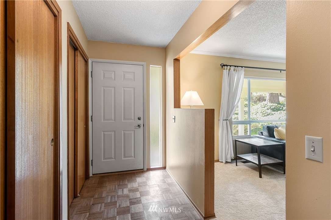 16404 Southeast 135th Street Renton, WA 98059 - Photo 2 of 22 a view of a room that has a bed and a window