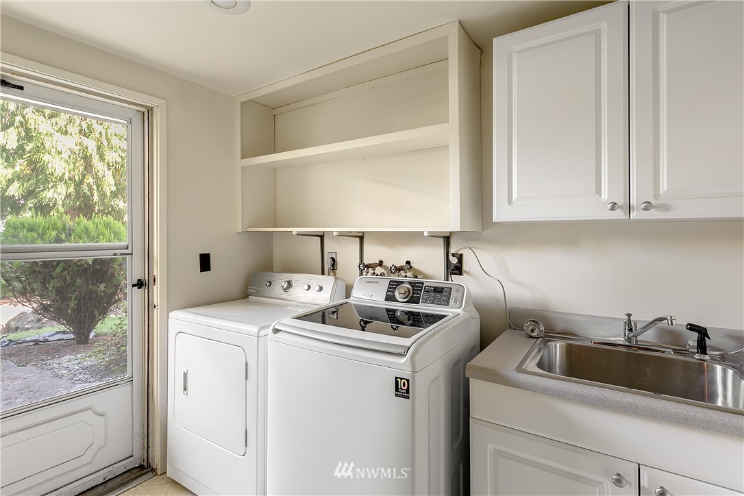 16404 Southeast 135th Street Renton, WA 98059 - Photo 12 of 22 a room with storage and utility