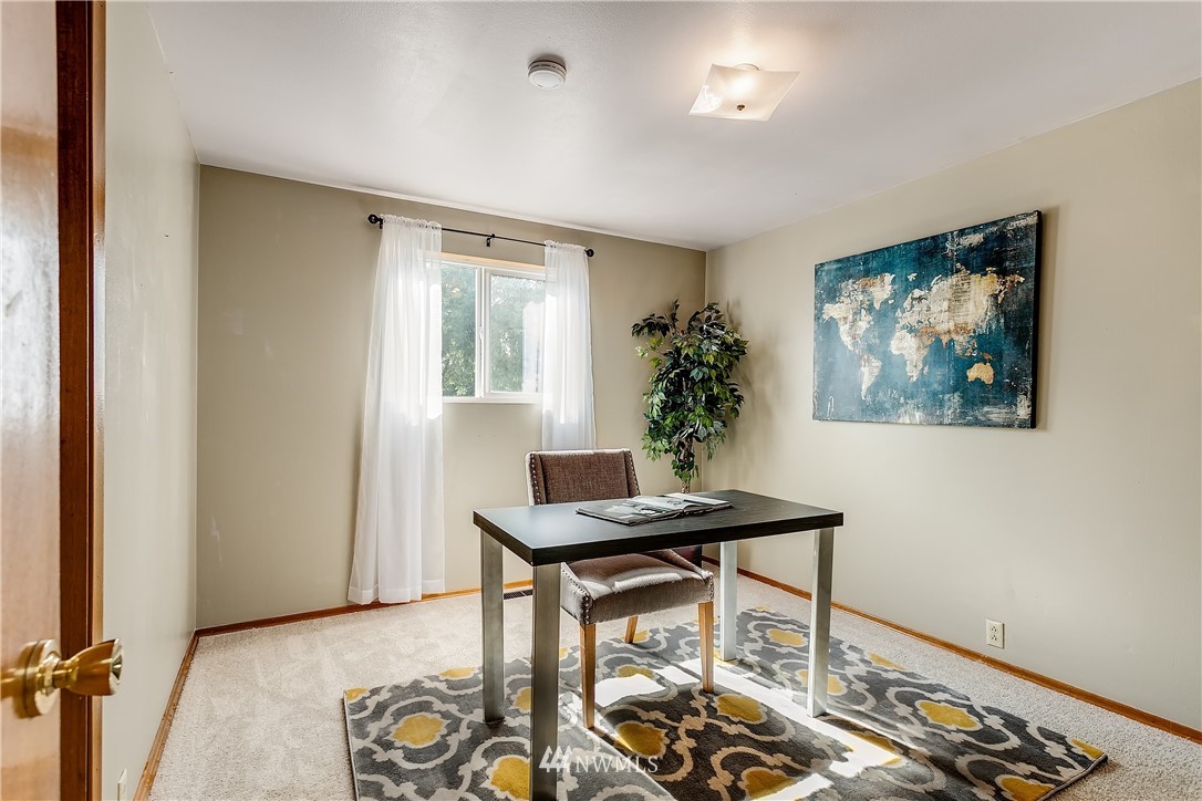 16404 Southeast 135th Street Renton, WA 98059 - Photo 13 of 22 a view of a room with furniture and wooden floor