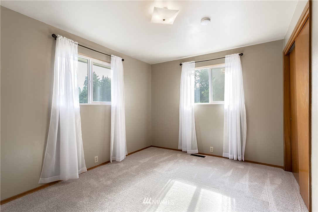 16404 Southeast 135th Street Renton, WA 98059 - Photo 16 of 22 a view of an empty room with a window