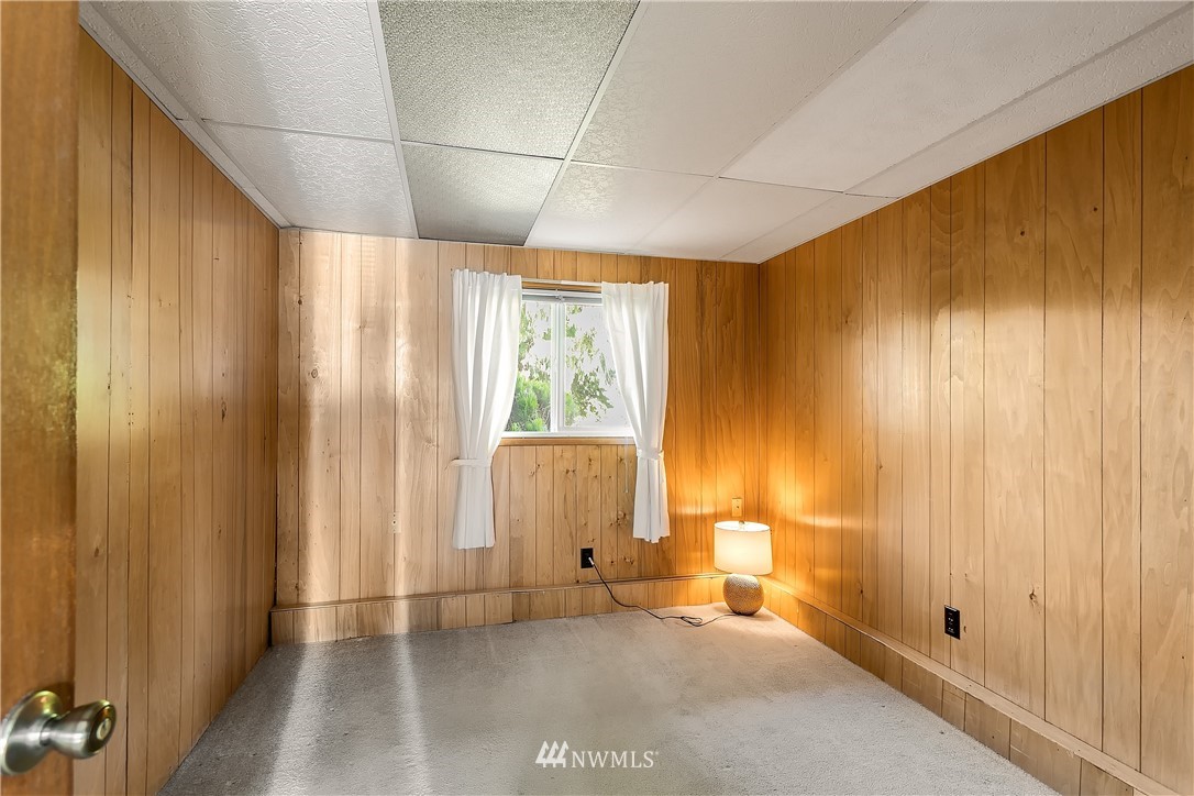 16404 Southeast 135th Street Renton, WA 98059 - Photo 20 of 22 a view of an empty room with a window