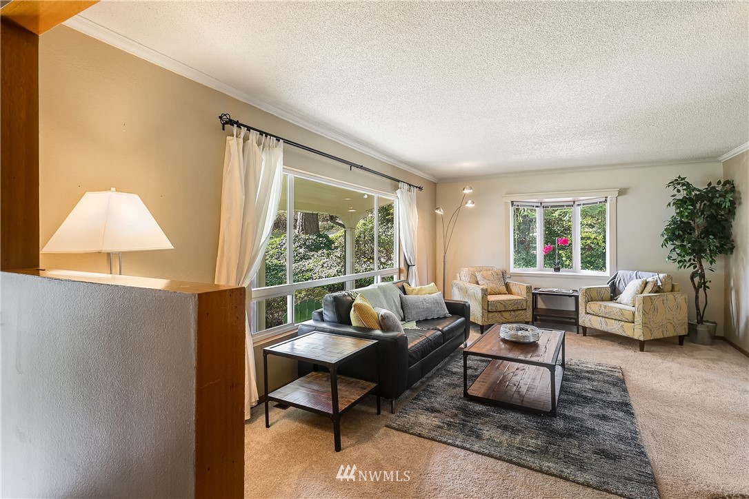 16404 Southeast 135th Street Renton, WA 98059 - Photo 3 of 22 a living room with furniture and a large window