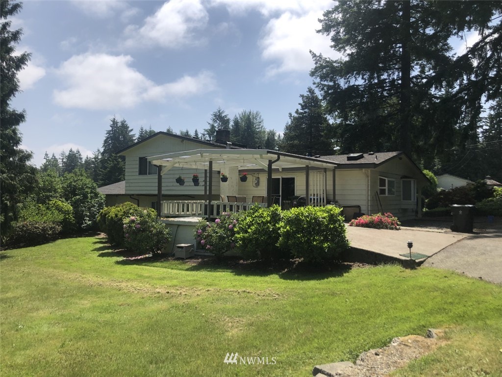 16404 Southeast 135th Street Renton, WA 98059 - Photo 22 of 22 a front view of house with yard and green space